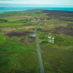 Aerial view of John O'Groats lush land north coast Scotland