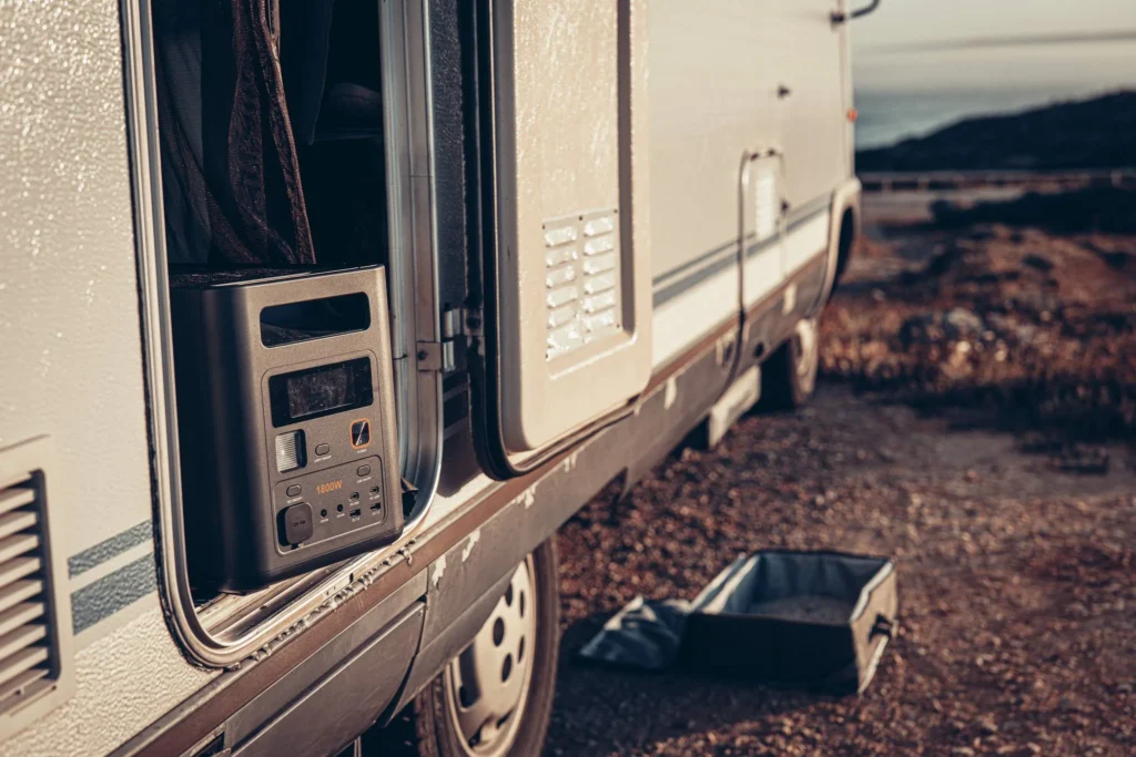 Aferiy Nomad 1800 electric station placed at the entrance of the camper van during an outdoor test