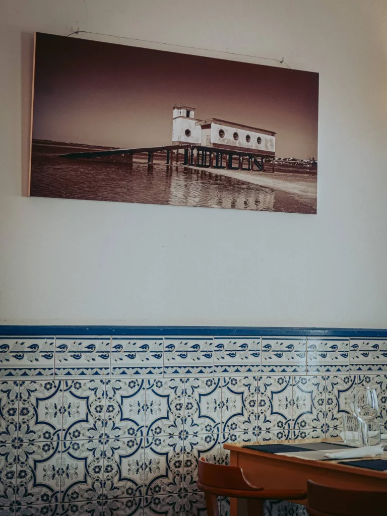 Table set with traditional blue and white Portuguese azulejos at Nikita restaurant in Tavira, Algarve