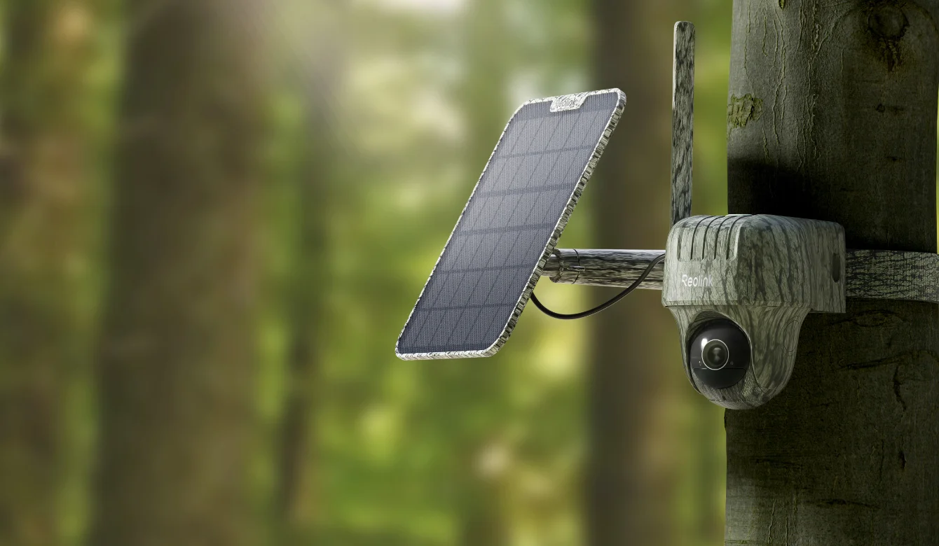 Reolink Go Ranger PT camera and its solar panel mounted on an outdoor post