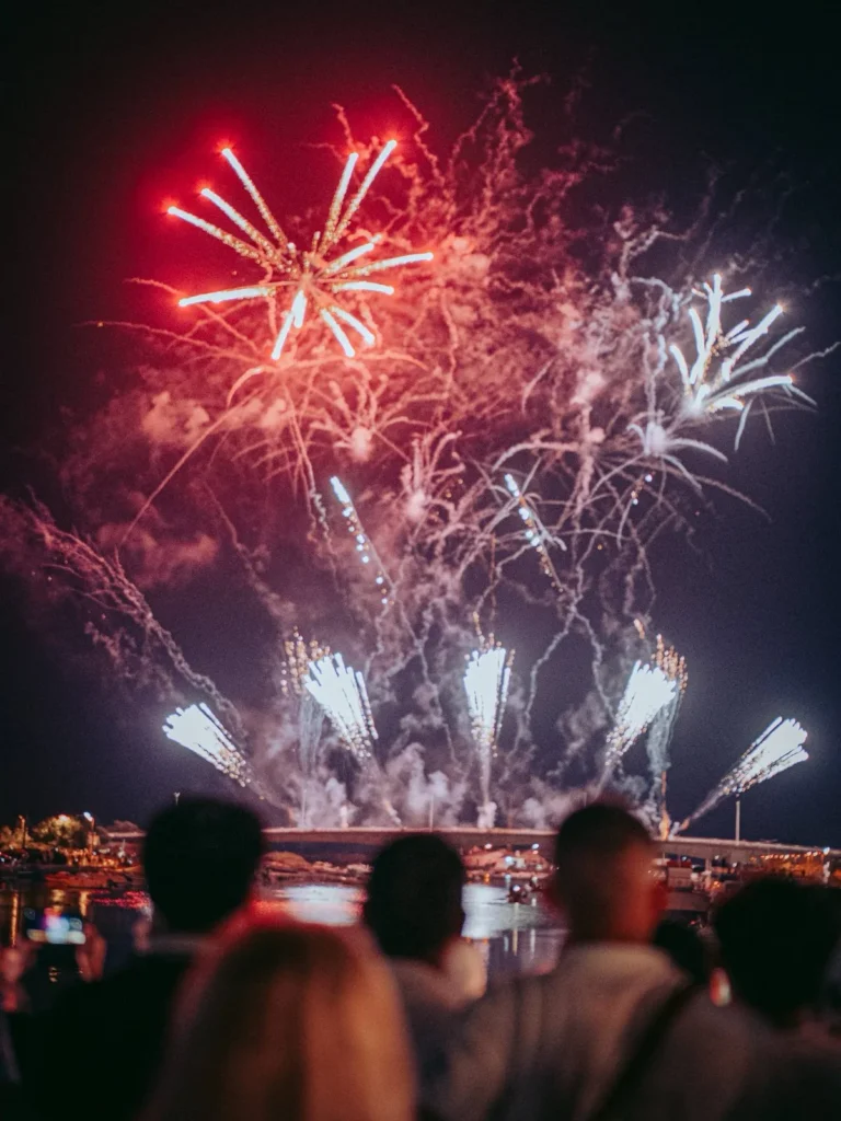 Midnight fireworks over the Tavira bridge for São João