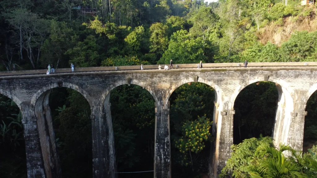 The nine-arch bridge in Ella is crossed by the tea train in Sri Lanka.