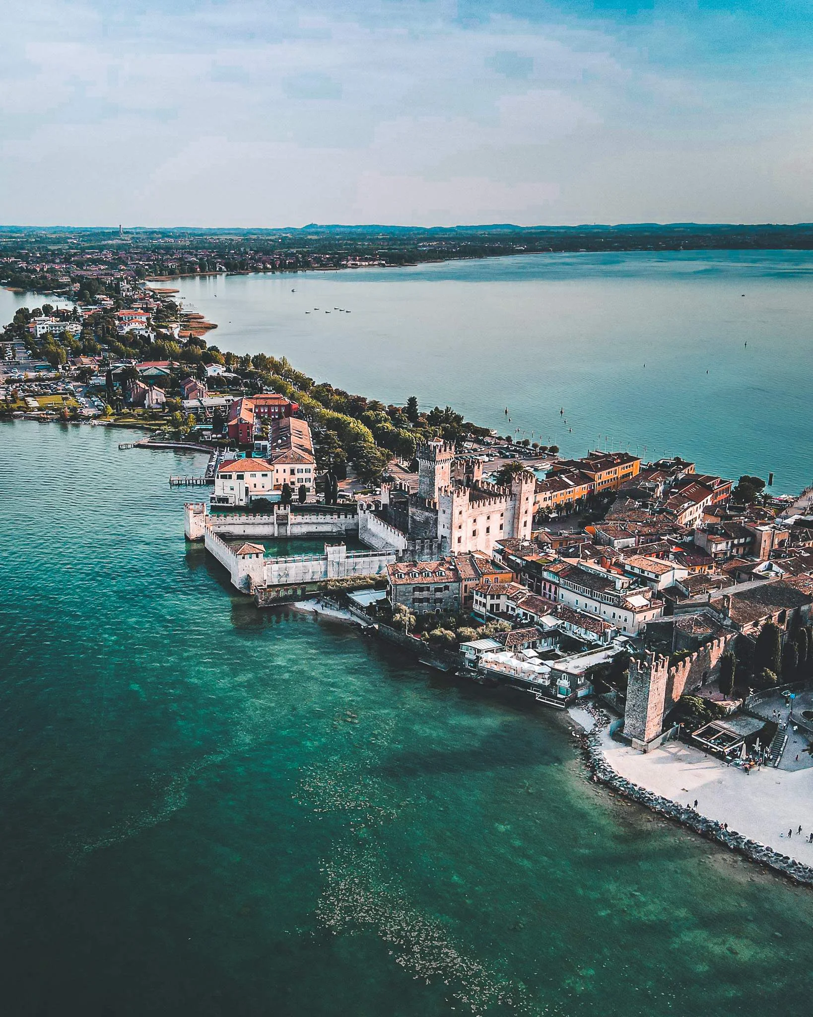 Aerial view of the Sirmione peninsula with the Scaliger Castle and Lake Garda