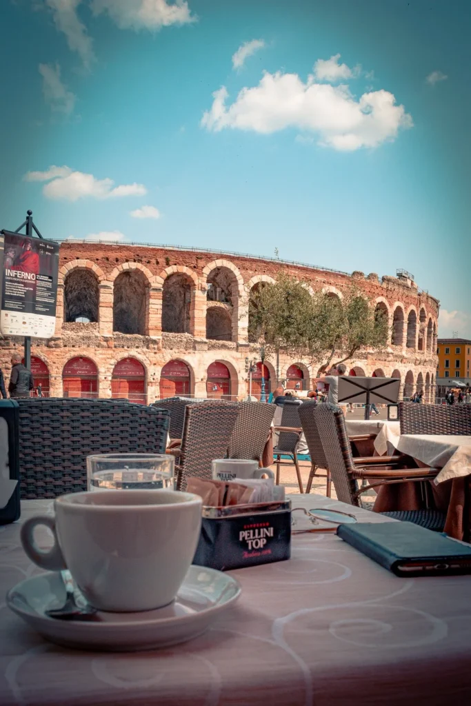 Café terrace in Verona facing the Roman amphitheater of the Arena Piazza Brà