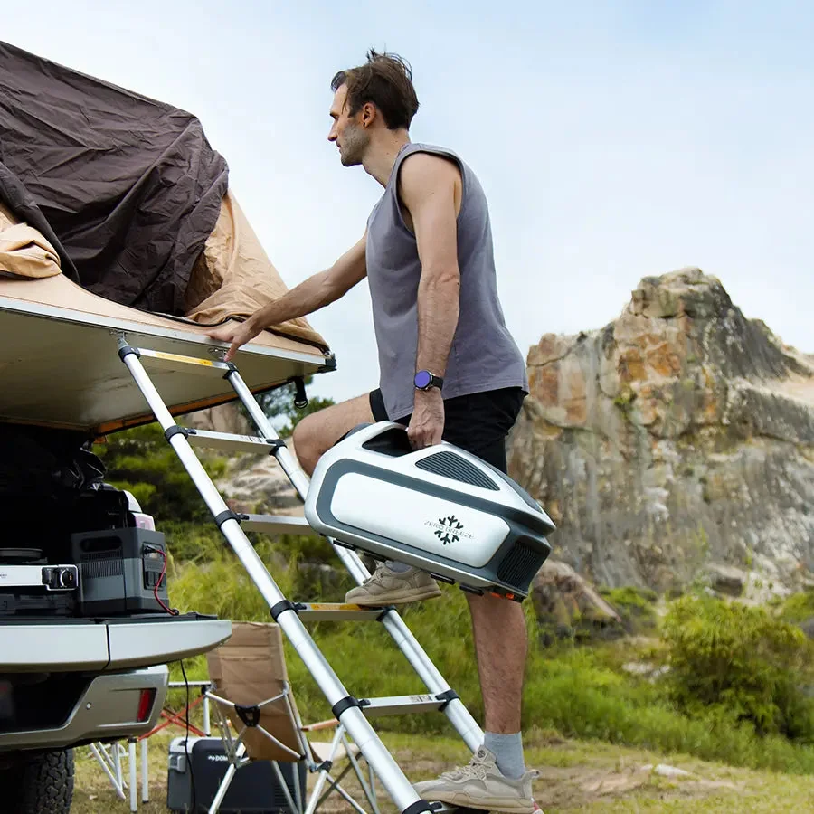 Zero Breeze Mark 3 hand-carried by its handle while camping