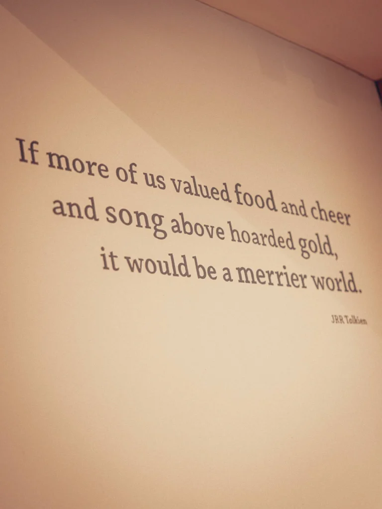 Quote from J.R.R. Tolkien inscribed on a wall of the restaurant at the Allan Park Hotel in Stirling, Scotland, visible during the summer of 2026.
