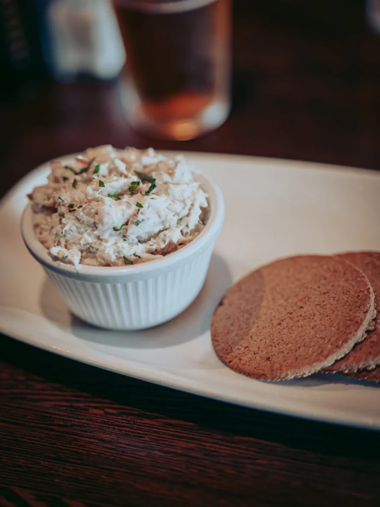 Smoked haddock pâté served in a ramekin with Highland oatcakes and a beer, at the Ben Nevis Bar in Fort William.