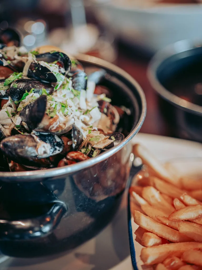 Fresh Isle of Mull mussels served as a main with skinny fries, chowder style with cream, white wine, leek and fennel, at the Ben Nevis Bar.