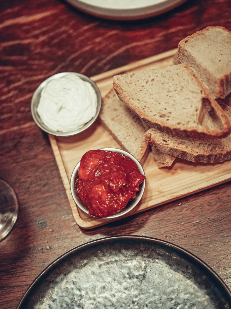 Bavarian Bake House sourdough (£6) at Stravaigin, Glasgow: sourdough served with the whipped butter, soft and creamy, and the gigantes plaki, big white beans in a strong tomato sauce.