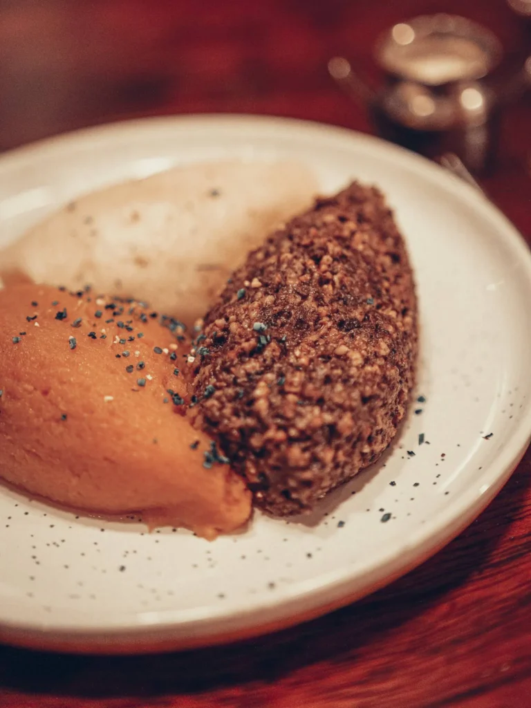 Stravaigin's Own Haggis served with neeps and mash tatties, turnip and potato mash, at Stravaigin in Glasgow. Xavier had the traditional version, Caroline the vegetarian one.