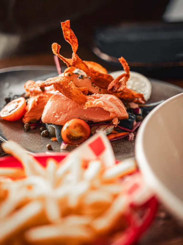 Hot-smoked salmon with crisp tuiles and fries at The Geographer in Fort William.