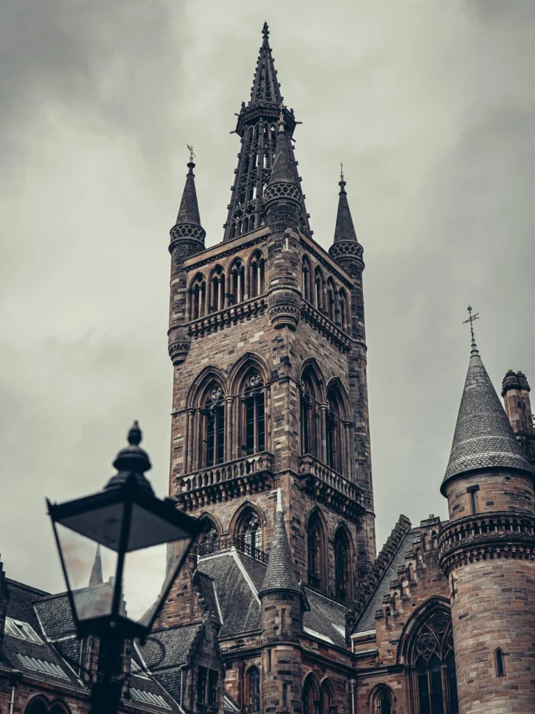Tour of the Main Building of the University of Glasgow, an old lantern in the foreground.