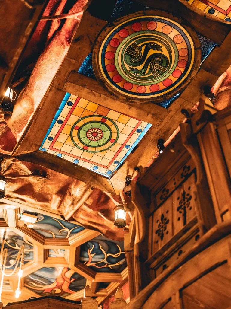 Wooden ceiling and stained glass with Celtic patterns of Waxy O'Connor's pub in Glasgow