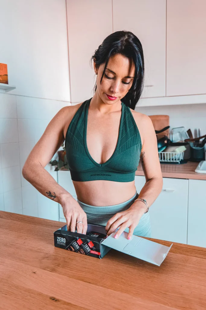 Opening a box of Prozis protein bars