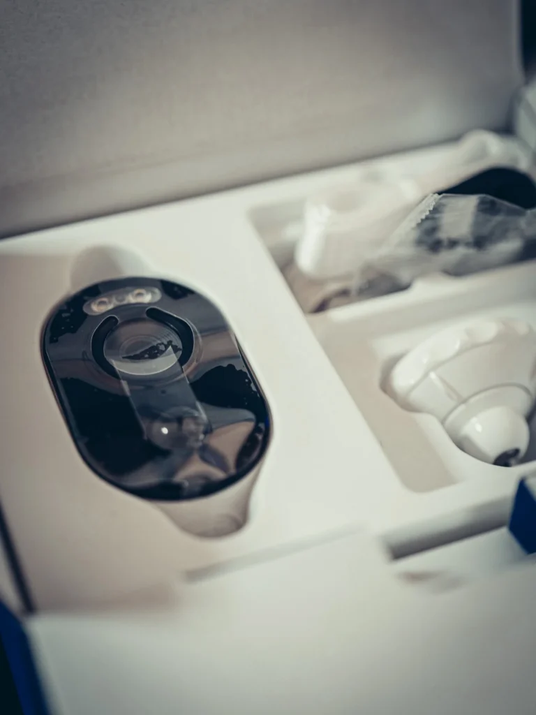 Open box of the Reolink Argus 3 Ultra with the camera and its accessories